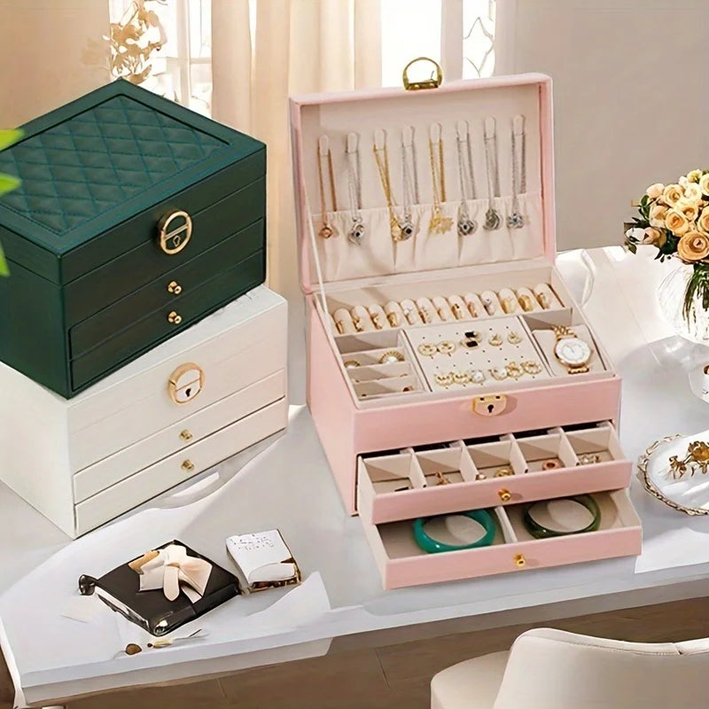 boîte rangement bijoux cuir blanc moderne élégante poignées métalliques verrouillable intérieure motifs géométriques