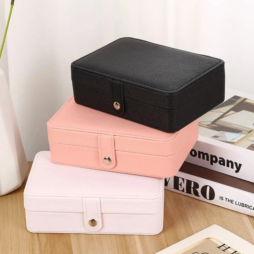 boîte bijoux simili cuir moderne noir rose bleu compartiments boucles anti poussière opaques haute