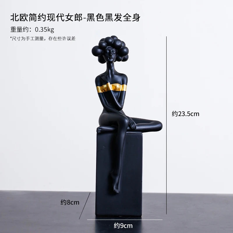 statuette décorative buste féminin noir blanc bleu or moderne minimaliste.surface lisse polie.formes arrondies socle
