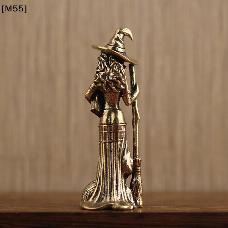 statuette sorcier bronze doré détails métalliques artisanal rétro chapeau pointu balai chat robe décoration