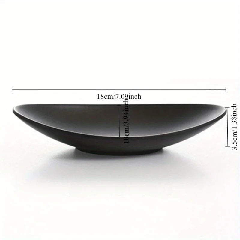 assiettes ovales forme feuille moderne noir mat decoration cuisine minimaliste plateau repas