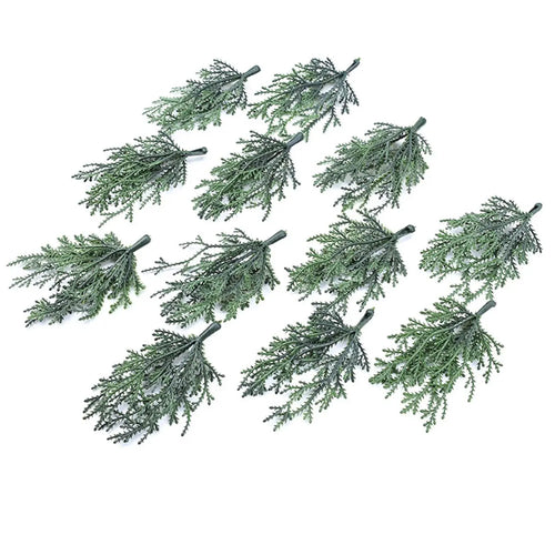 décoration noël couronne guirlande branches artificielles cadeaux emballés rubans dorés traditionnel festive