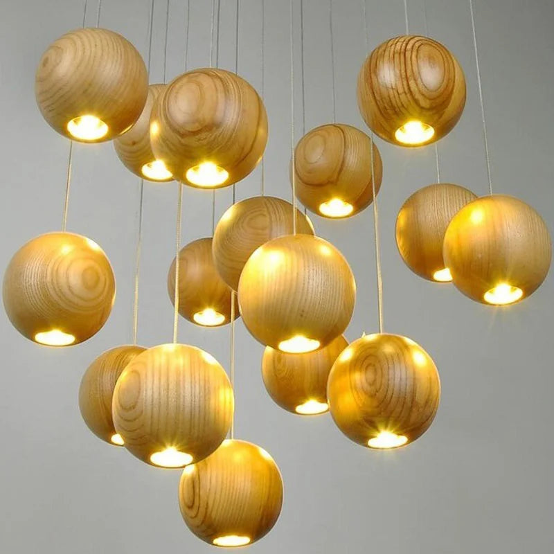 luminaire suspension bois massif moderne éclairage intérieur salon cuisine restaurant naturel