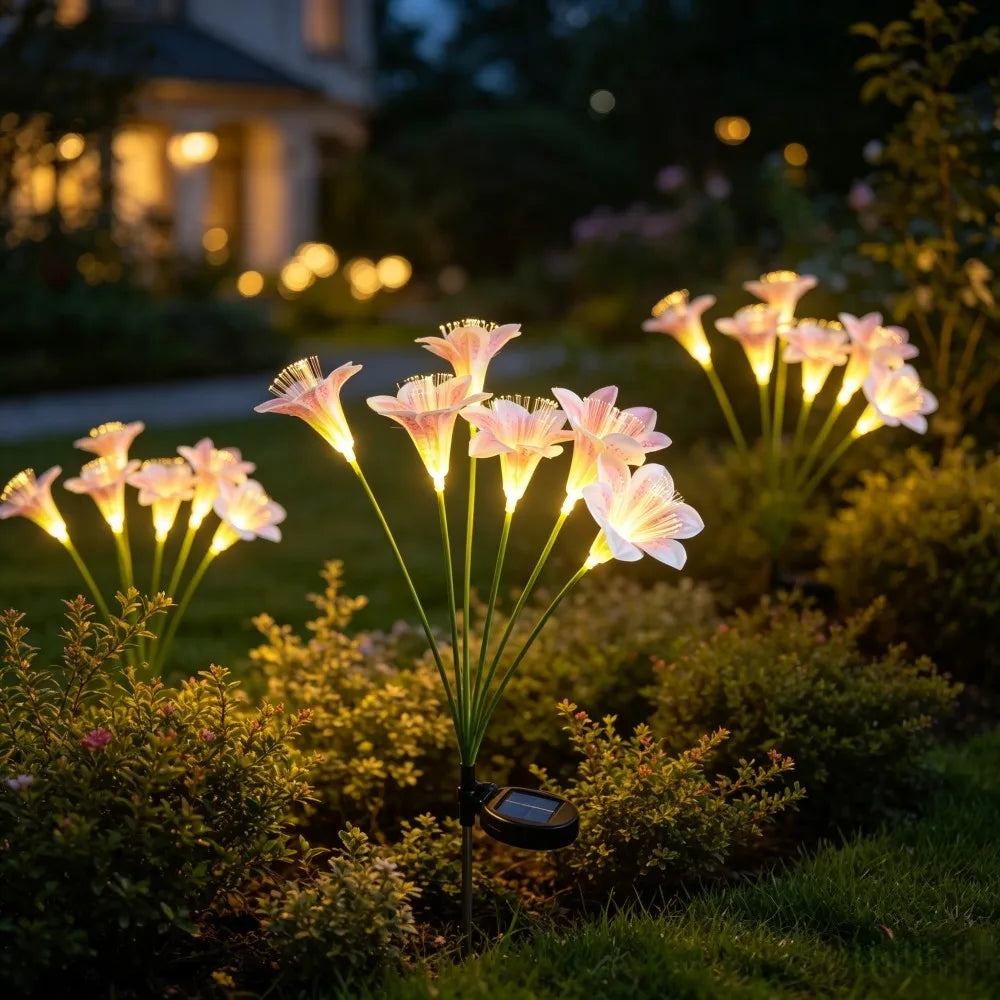 lampions solaires fleurs lys blanc jaune rose modernes extérieurs patio jardin piquet métallique led