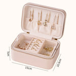 boîte bijoux simili cuir rose clair marron moderne fermeture glissière boucles oreilles bagues colliers