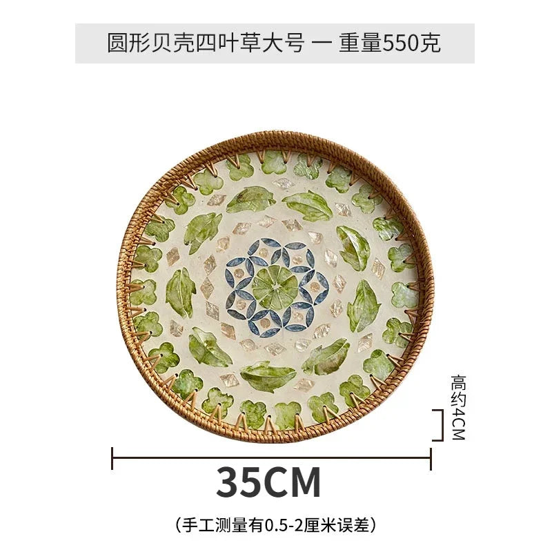 plateau rond rotin coquillages feuilles naturelles décoration boho assiette fruits pain petit déjeuner