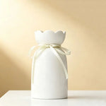 vase céramique blanc moderne poterie lisse ruban décoration intérieur simple table restaurant