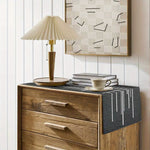 nappe table rayée noir blanche texturée moderne minimaliste assiettes couverts fruits livres