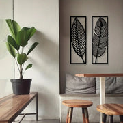 décoration murale moderne feuilles stylisées panneau rectangulaire noir blanc minimalisteintérieur contemporain deux pièces fixations
