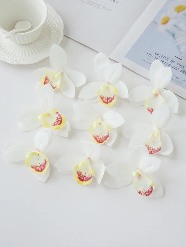 décoration intérieure orchidées artificielles soie violet rose jaune blanc réaliste festif mariage anniversaire