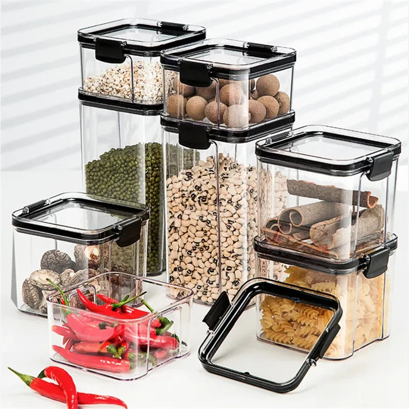 boîtes rangement alimentaire transparentes poignées noires multiple tailles réutilisables modernes pratiques épices pâtes graines