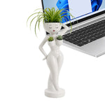 pots fleurs statuette blanche visage stylisé moderne minimaliste intérieur salon