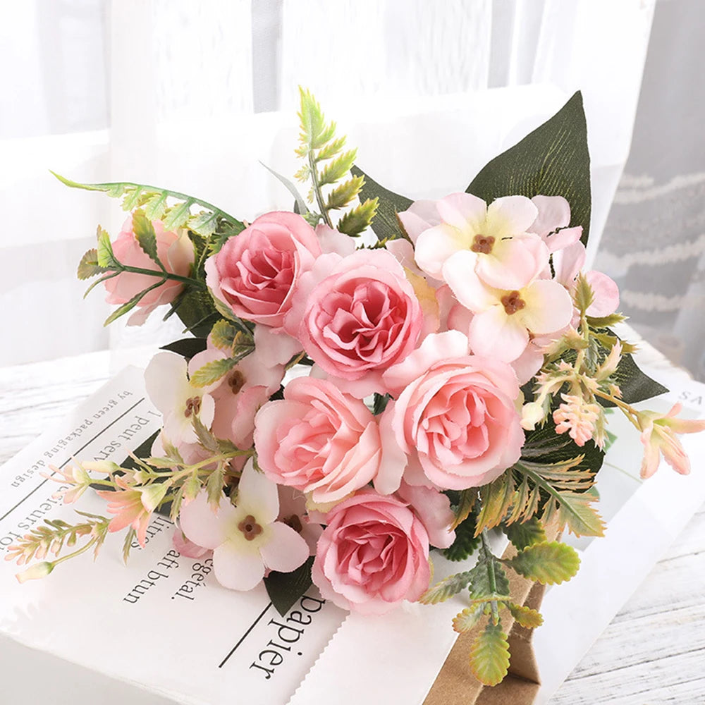 bouquet fleurs artificielles violet rose pêche blanc vert feuilles vertes vase transparent décoration intérieure