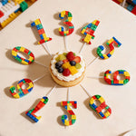 bougies anniversaire chiffres couleurs brique construction rouge jaune bleu vert ludique piquet