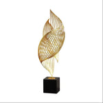 sculpture décorative feuille stylisée or noir moderne minimaliste ajourée asiatique fixée socle bois