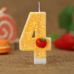 bougies numeriques jaune paillette pomme rouge anniversaire decoratif thème feuille verte paillettes dorées tringle