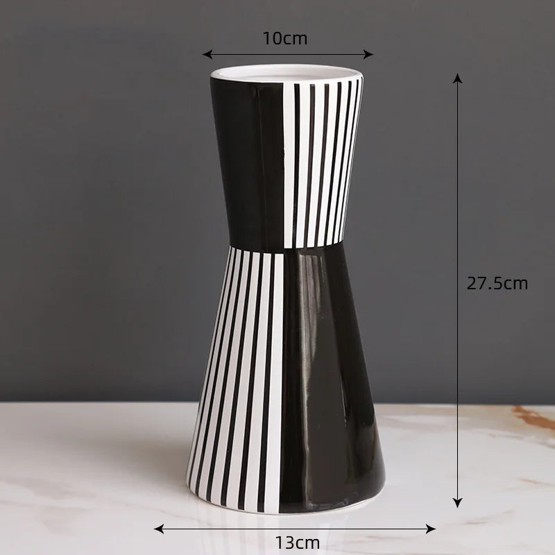 vase céramique rayures noires blanches moderne décoration intérieure arrangement fleurs artificielles minimaliste