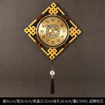 horloge murale or noir motif géométrique tissu classique tassel moderne