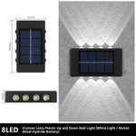 lampe murale solaire noire moderne panneau solaire blanc led extérieure jardin paysage