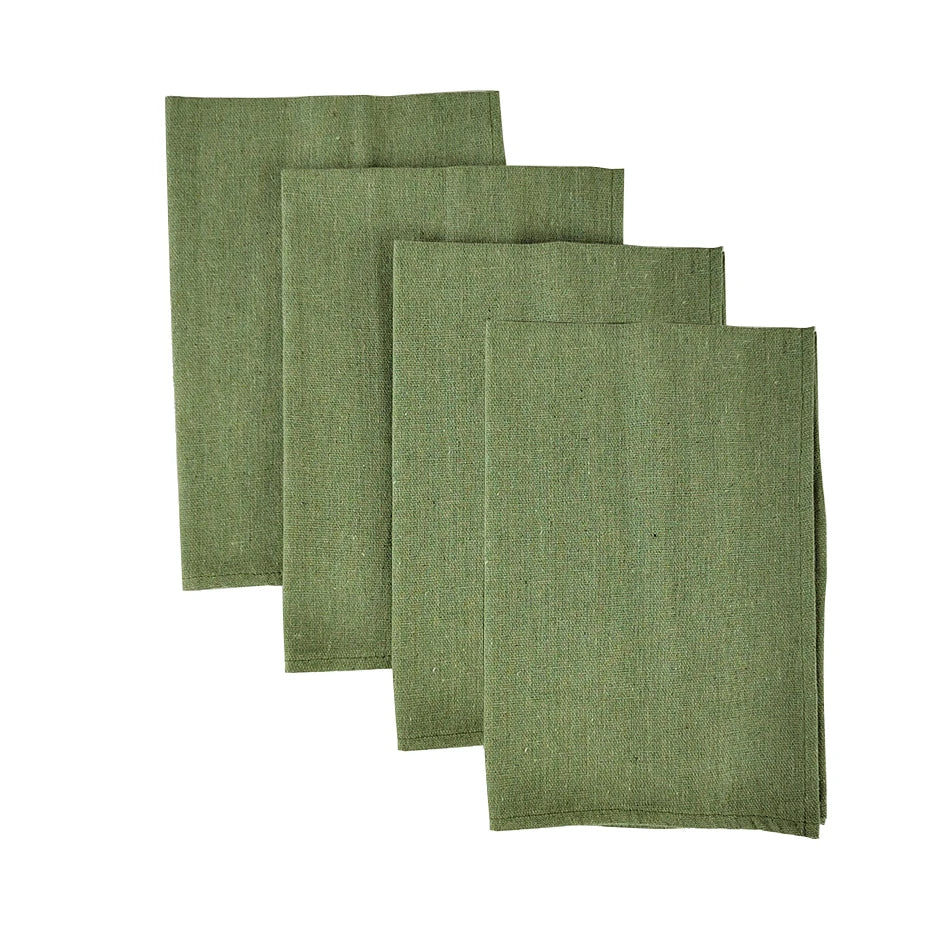 Ensemble de quatre serviettes vertes en lin pour l'usage domestique.