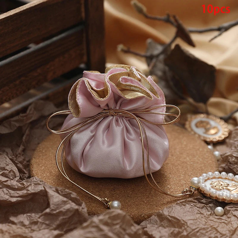 sac cadeau violet satiné ruban doré blanche élégant anniversaire bijoux cadeau opulent 10 pièces
