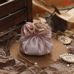 sac cadeau violet satiné ruban doré blanche élégant anniversaire bijoux cadeau opulent 10 pièces