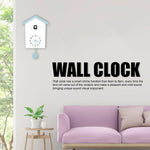 Horloge murale oiseau design noir sur fond neutre