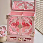 armoire bijoux blanc rose ornements floraux compartiments poignées décoratives classique baroqueversible lumière cosmétiques