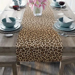 nappe polyester léopard beige marron foncée décoration intérieure table anniversaire assiettes verres couverts bol