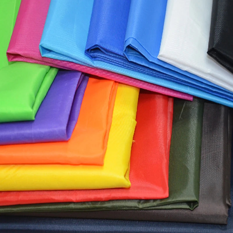 tissu polyester taffetas imperméable rose bleu vert orange rouge noir blanc 1mX150cm