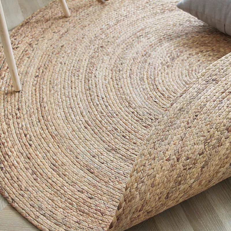 tapis rond tissé motifs concentriques couleur beige rustique naturel salon maisonhôtel