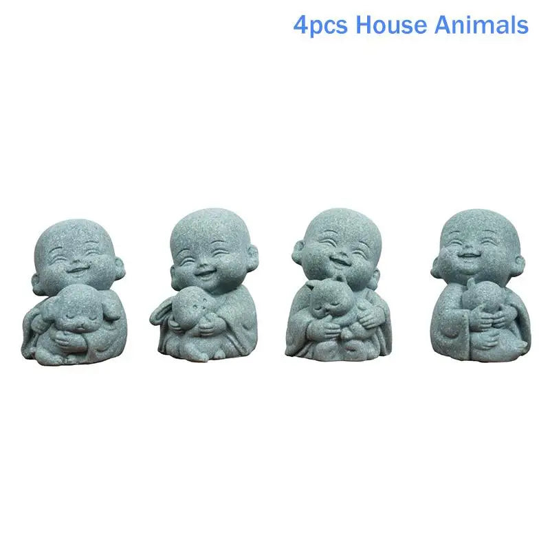 statues moines résine gris texture granulée art artisanal jardin zen serein souriantextérieur decoration