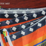 foulard ethnique motifs traditionnels franges colorées bleu vert orange jaune