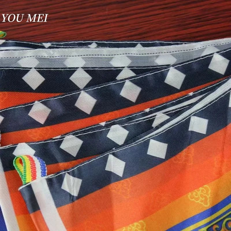 foulard ethnique motifs traditionnels franges colorées bleu vert orange jaune