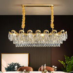 lustre cristal moderne doré transparent finition brillante élégant pendeloque chambre salon