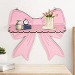 étagère murale bois rose clair motif ruban moderne clips métalliques