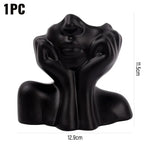 support pinceaux maquillage or argent noir visage stylisé moderne sculpturaliaux pinceaux