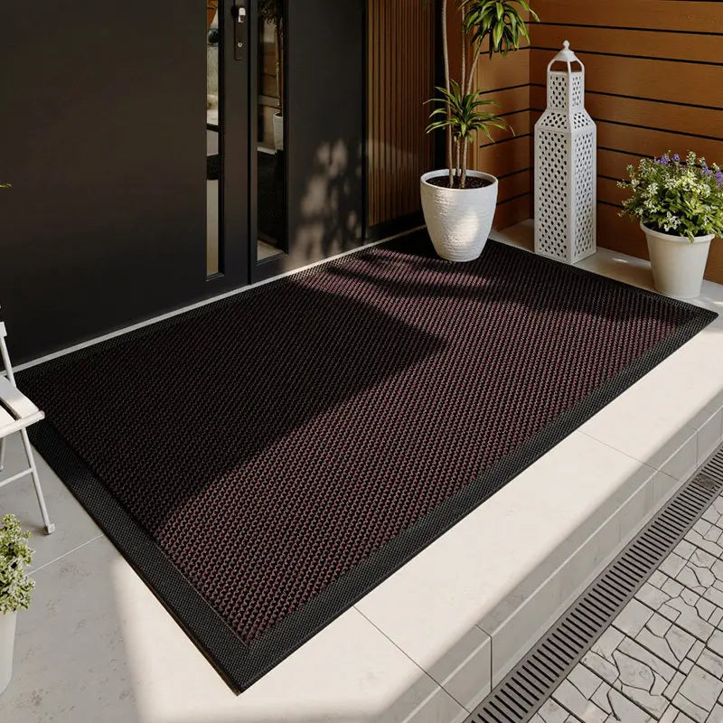 tapis sol antidérapant moderne noir marron bordure texturée structure tridimensionnelle minimaliste entrée porche