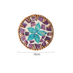 tapis tasse bohème motifs floraux assiettes décoratives cercles colorés bord marron tresse artisanal table