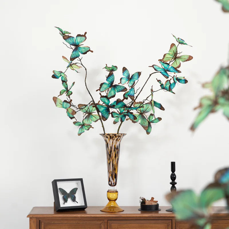 vase verre ambré motif moucheté moderne décoration intérieure bougie papillon fleurs violettes chandelier