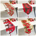 table table noël fleurs poinsettia feuilles vertes bordure dorée classique festif blanc rouge vert