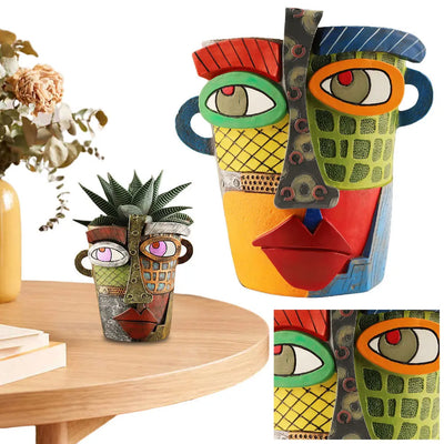 Pot de fleurs en résine avec visage abstrait coloré gris foncé