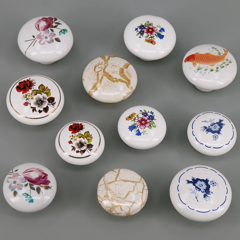 boutons meuble céramique blanc or noir fleurs poissons géométriques classiques