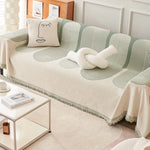 couverture canapé moderne rayures horizontales franges beige crème gris clair salon intérieur