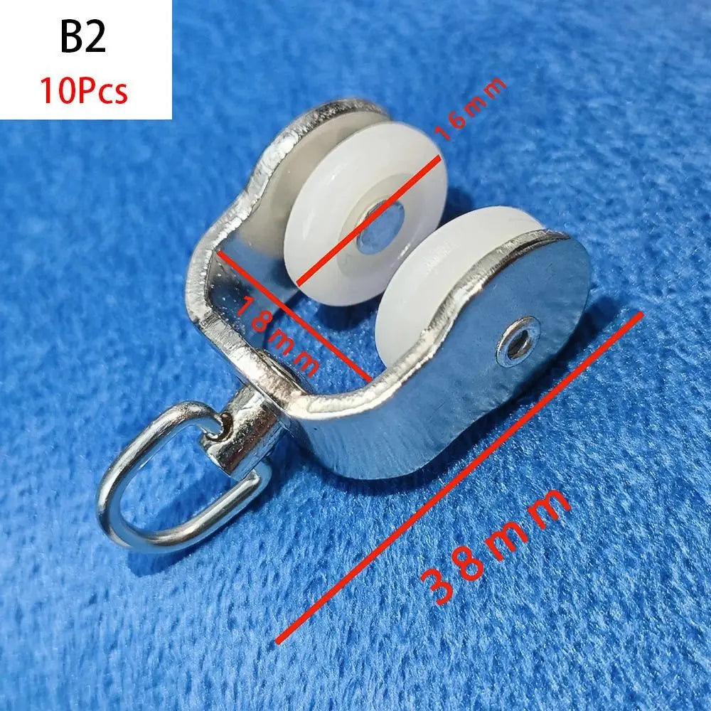 rouleaux rideaux blancs anneaux métalliques modernes quincailleries fixations poulies tringles curseurs roues mat inoxydables