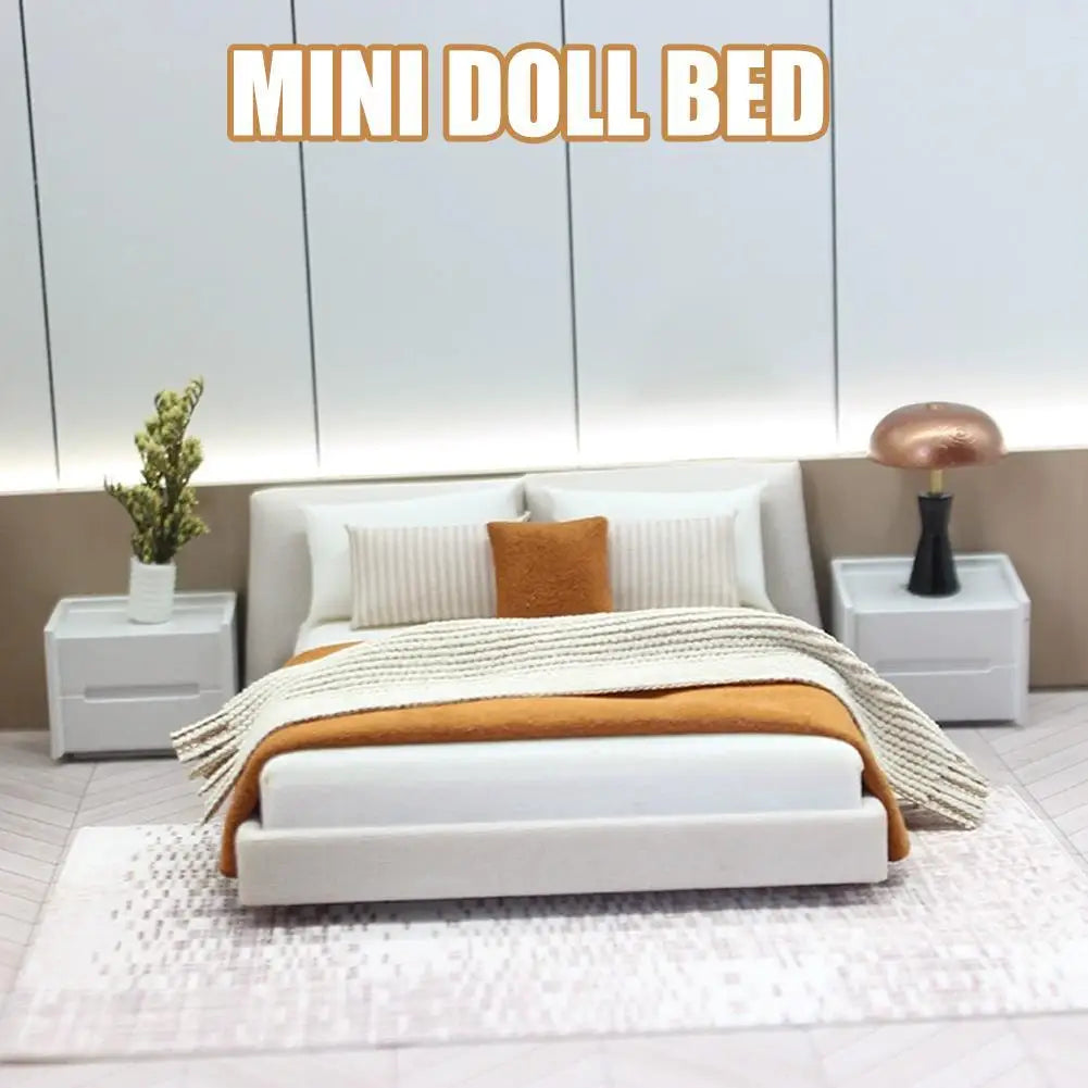 lit miniature poupée blanc tissus texturés moderne couettes oreillers table chevet lampe tapis minimaliste
