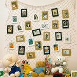décoration murale filet pêche bois clips photos encadrées étoiles mer coquillages beige clair rustique