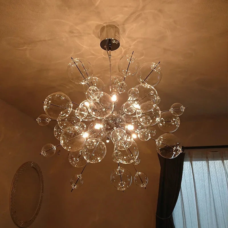 suspension lumineuse moderne boules sphériques transparentes dorées argentées câble suspension intérieur chambre salonhôtel