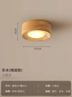 lampe moderne or noir bois brillant éclairage quotidien monté surface minimaliste
