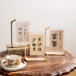 cadre photo pied bois clair transparent calligraphie asiatique minimaliste pied incurvé cartes illustrées six
